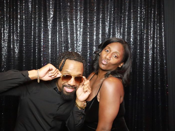 Couple posing at a Riverside photo booth